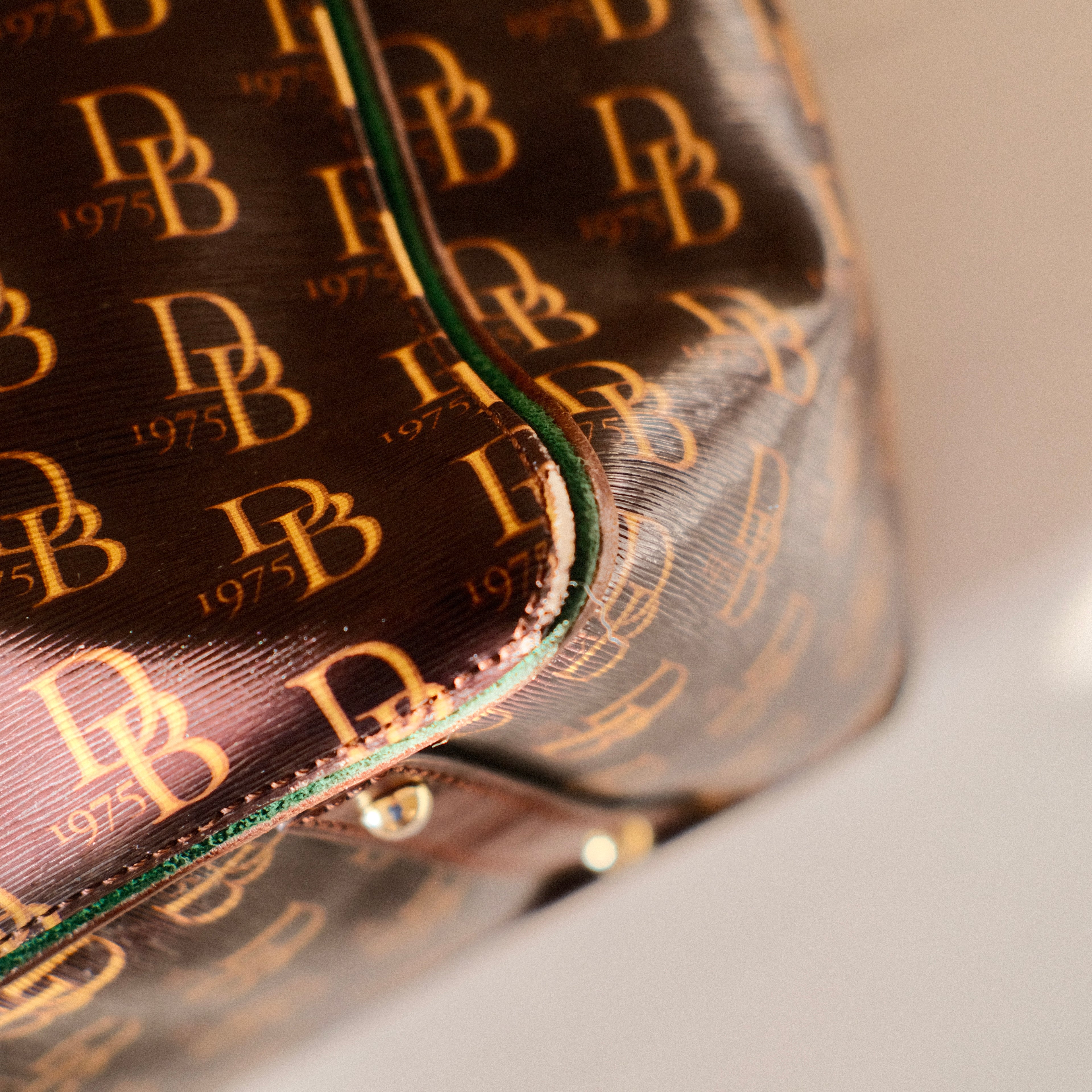 Dooney & Bourke Monogram Coated Canvas Drawstring Shoulder Bag