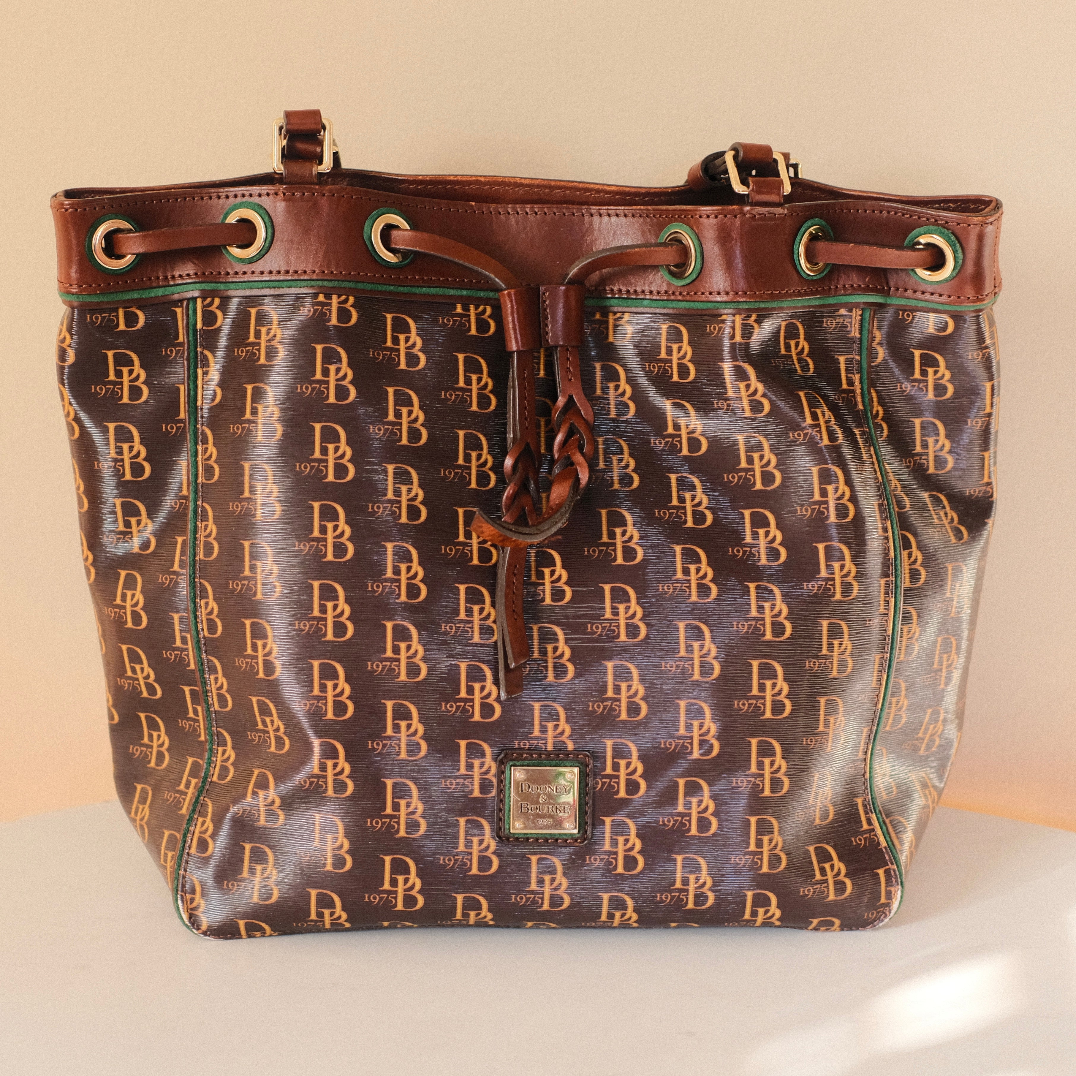 Dooney & Bourke Monogram Coated Canvas Drawstring Shoulder Bag